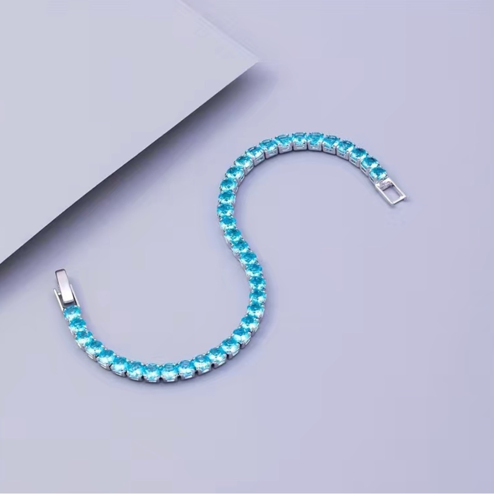 Beautiful Round Blue Topaz Bracelet In White Gold - Picture 8 of 12